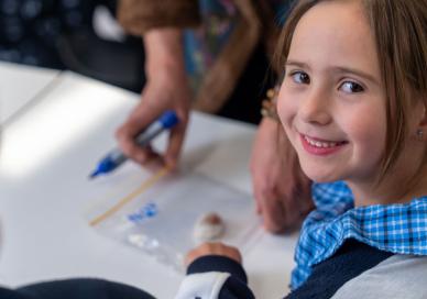 Student looking happy at the camera