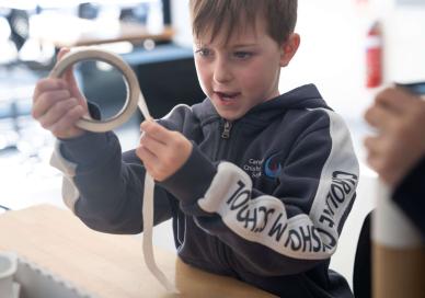 Student using masking tape