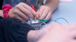 Students working on a switch