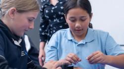 Students working on a switch