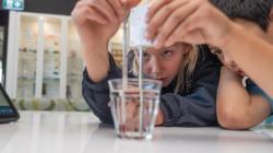 Students using a thermometer